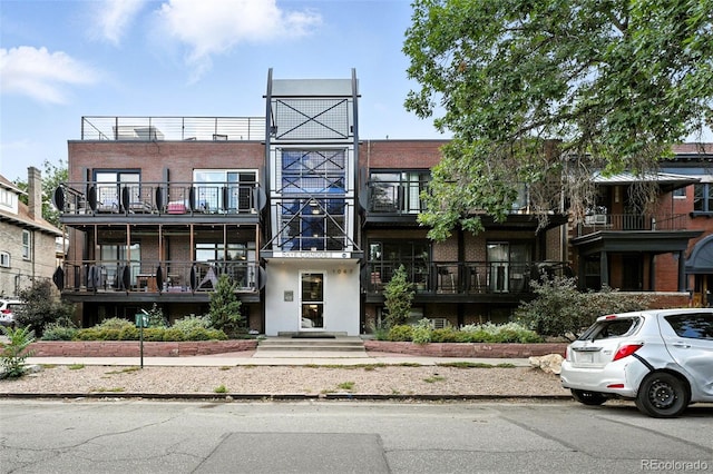 1045 N Clarkson St Unit 102, Denver, CO 80218 - view of front of home with brick siding