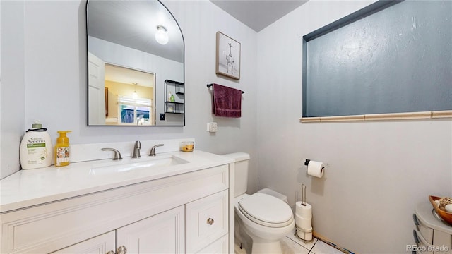 41 S Fenton St, Lakewood, CO 80226 - bathroom featuring vanity and tile patterned floors