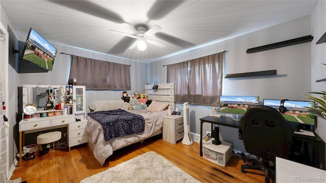41 S Fenton St, Lakewood, CO 80226 - bedroom featuring wood finished floors, a desk, and ceiling fan