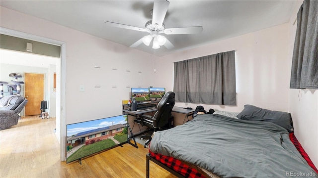 41 S Fenton St, Lakewood, CO 80226 - bedroom with wood finished floors, a desk, and ceiling fan