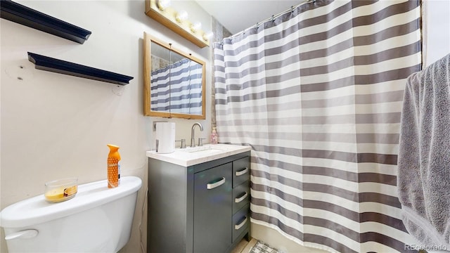 41 S Fenton St, Lakewood, CO 80226 - full bathroom featuring vanity and a shower with shower curtain