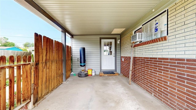 41 S Fenton St, Lakewood, CO 80226 - view of patio / terrace with a carport and a wall mounted AC