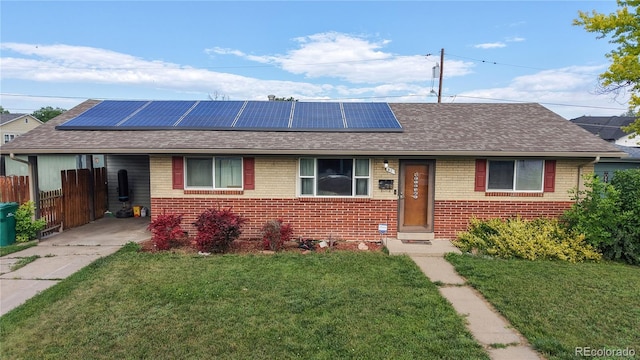 41 S Fenton St, Lakewood, CO 80226 - ranch-style house featuring brick siding, concrete driveway, and a shingled roof