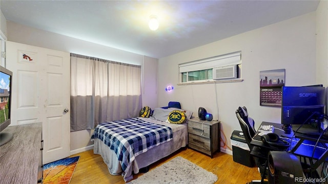 41 S Fenton St, Lakewood, CO 80226 - bedroom with light wood finished floors and an office area