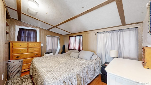 41 S Fenton St, Lakewood, CO 80226 - bedroom with vaulted ceiling and light wood-style floors