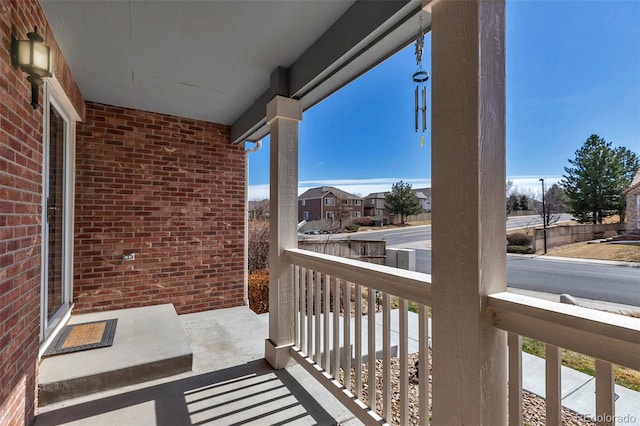 balcony featuring a residential view