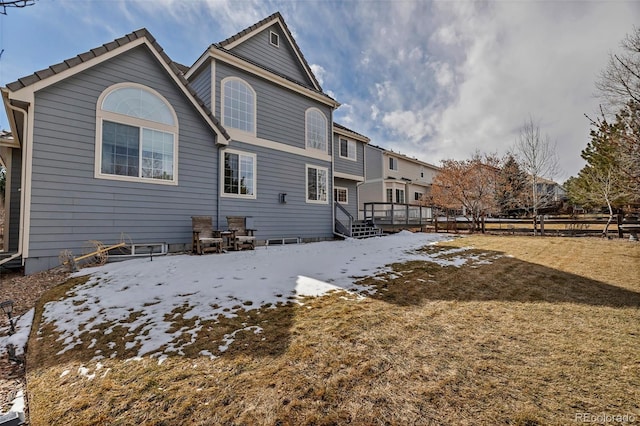 view of snow covered house