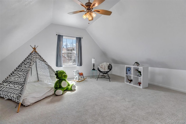 rec room with lofted ceiling, carpet, baseboards, and ceiling fan