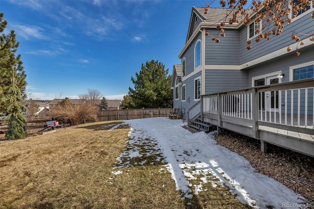 view of yard with a wooden deck and fence private yard