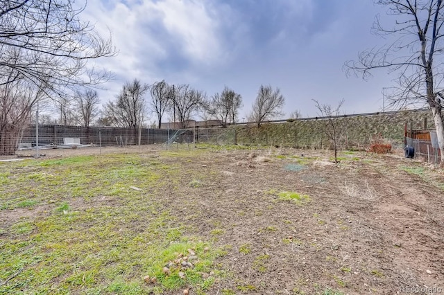 view of yard featuring fence