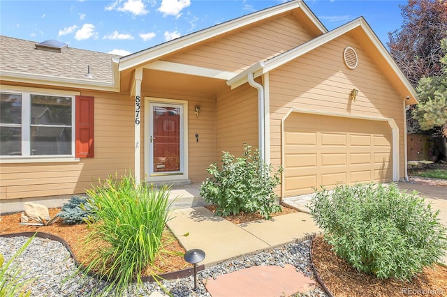 8376 Cobblestone St, Highlands Ranch, CO 80126 - view of front of house with a garage, concrete driveway, and roof with shingles