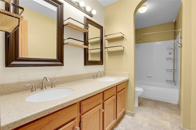 8376 Cobblestone St, Highlands Ranch, CO 80126 - bathroom featuring double vanity and bathtub / shower combination