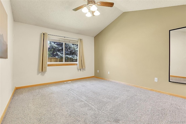 8376 Cobblestone St, Highlands Ranch, CO 80126 - spare room featuring vaulted ceiling, a ceiling fan, carpet, and a textured ceiling