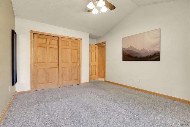 8376 Cobblestone St, Highlands Ranch, CO 80126 - unfurnished bedroom featuring carpet, lofted ceiling, ceiling fan, and a closet