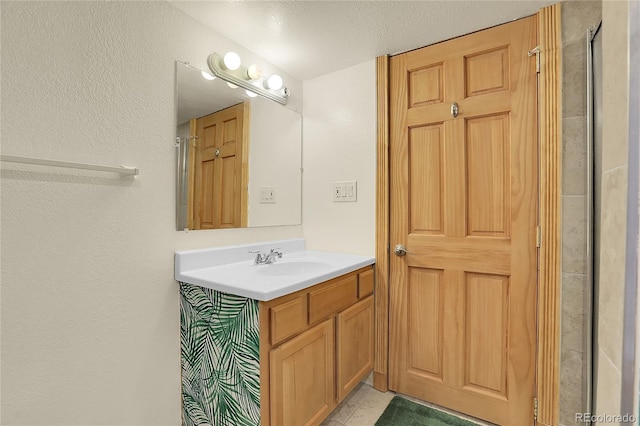 8376 Cobblestone St, Highlands Ranch, CO 80126 - bathroom featuring vanity and a textured ceiling