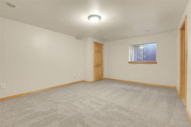 8376 Cobblestone St, Highlands Ranch, CO 80126 - unfurnished room with light carpet and a textured ceiling