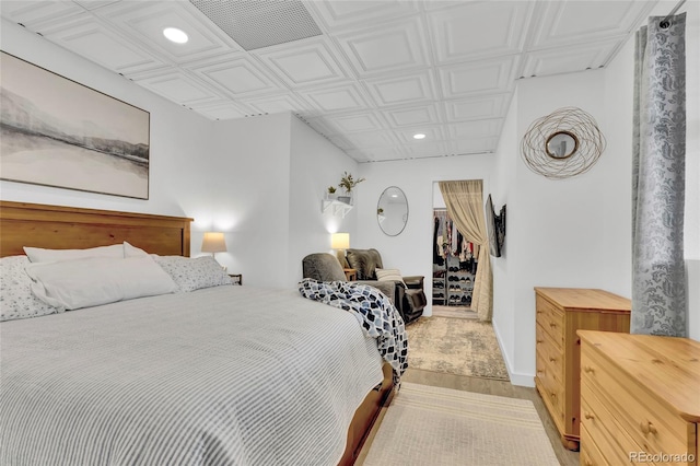 bedroom featuring light hardwood / wood-style floors