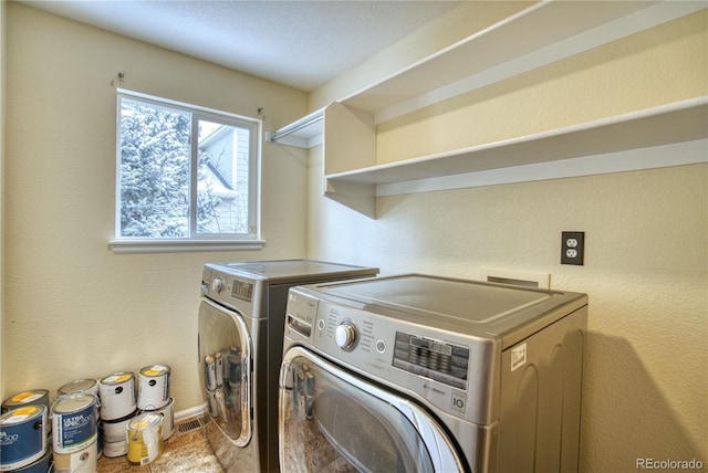 laundry area featuring separate washer and dryer