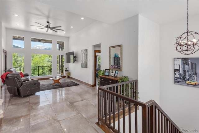 16985 County Road 306, Buena Vista, CO 81211 - tiled living area featuring a chandelier, recessed lighting, ceiling fan, and a towering ceiling