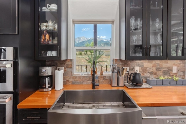 16985 County Road 306, Buena Vista, CO 81211 - bar with decorative backsplash and a sink