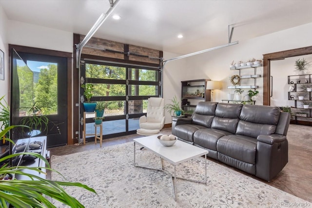16985 County Road 306, Buena Vista, CO 81211 - living area with a garage, healthy amount of natural light, concrete flooring, and recessed lighting