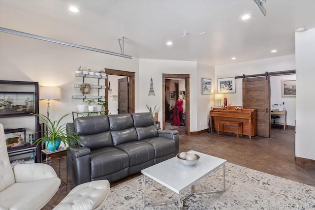 16985 County Road 306, Buena Vista, CO 81211 - living room featuring a barn door, recessed lighting, and finished concrete floors