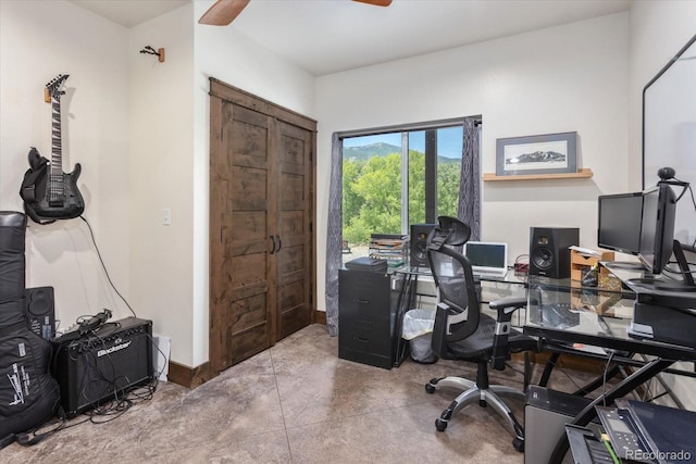 16985 County Road 306, Buena Vista, CO 81211 - home office with a ceiling fan and finished concrete floors