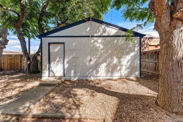 garage with fence