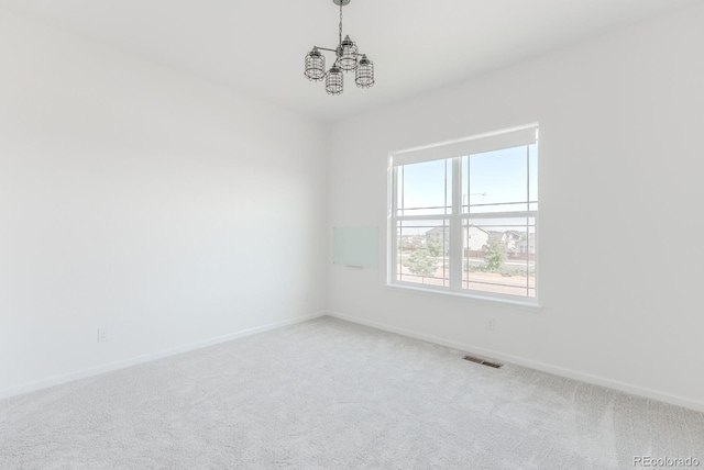 14345 Dahlia St, Thornton, CO 80602 - unfurnished room with a chandelier and carpet floors