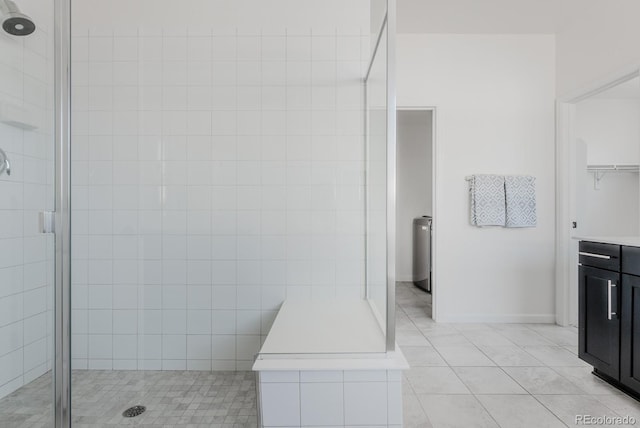 14345 Dahlia St, Thornton, CO 80602 - full bathroom featuring a stall shower, tile patterned flooring, and vanity