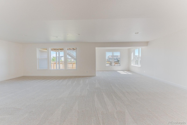 14345 Dahlia St, Thornton, CO 80602 - spare room with light colored carpet and baseboards