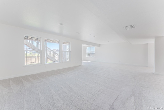 14345 Dahlia St, Thornton, CO 80602 - unfurnished living room featuring light colored carpet and baseboards