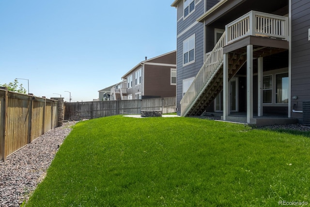 14345 Dahlia St, Thornton, CO 80602 - fenced backyard featuring stairs and a deck