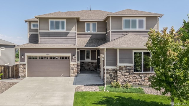 14345 Dahlia St, Thornton, CO 80602 - view of front of home featuring concrete driveway, a garage, a shingled roof, and stone siding