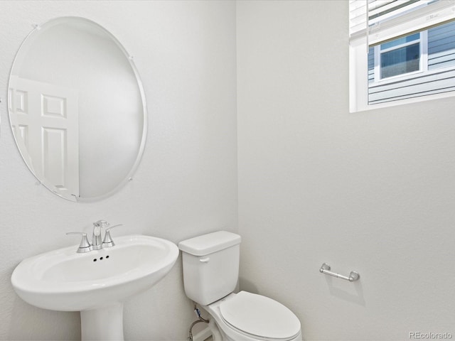 7324 27th Street Ln, Greeley, CO 80634 - bathroom featuring toilet and a sink