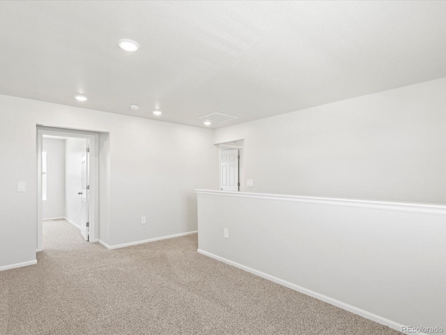 7324 27th Street Ln, Greeley, CO 80634 - unfurnished room featuring light carpet, recessed lighting, and baseboards