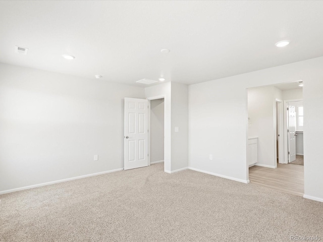 7324 27th Street Ln, Greeley, CO 80634 - empty room featuring recessed lighting, light carpet, and baseboards