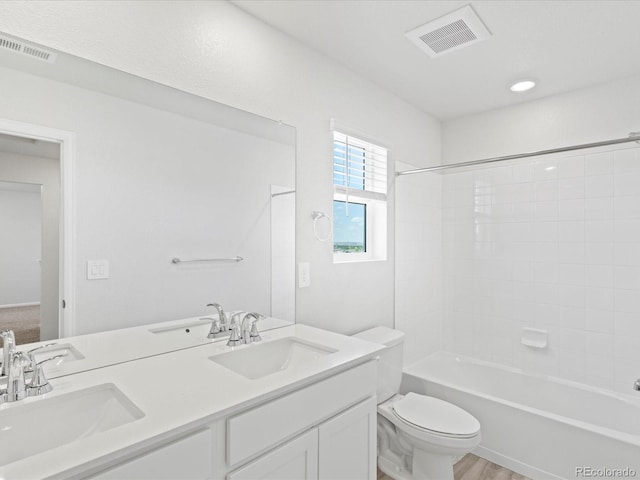 7324 27th Street Ln, Greeley, CO 80634 - full bath with toilet, double vanity, and tub / shower combination