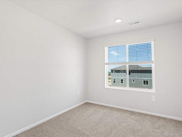 7324 27th Street Ln, Greeley, CO 80634 - spare room featuring carpet floors and baseboards