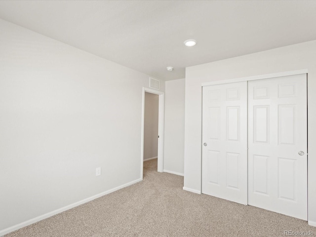 7324 27th Street Ln, Greeley, CO 80634 - unfurnished bedroom with carpet, baseboards, and a closet