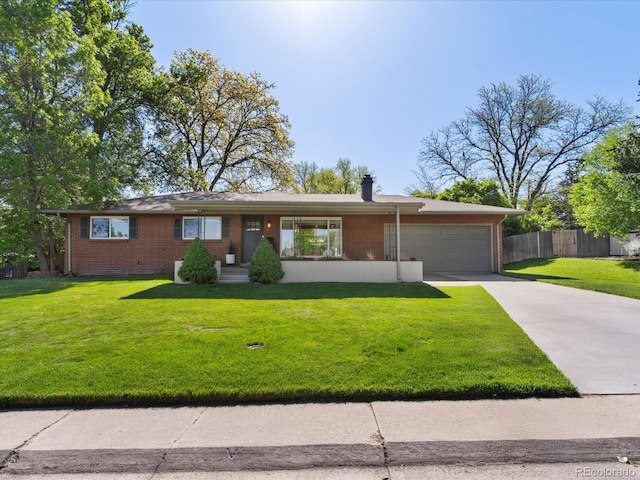 3560 S Glencoe St, Denver, CO 80237 - single story home with an attached garage, brick siding, concrete driveway, and a chimney