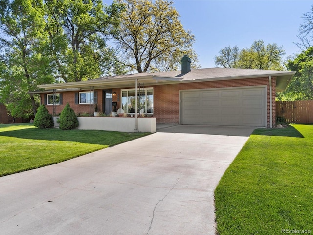 3560 S Glencoe St, Denver, CO 80237 - ranch-style house with a garage, brick siding, and concrete driveway