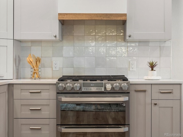 3560 S Glencoe St, Denver, CO 80237 - kitchen with double oven range, tasteful backsplash, and light countertops