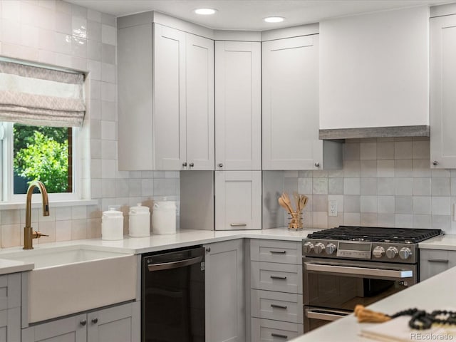 3560 S Glencoe St, Denver, CO 80237 - kitchen featuring double oven range, dishwasher, a sink, tasteful backsplash, and light countertops