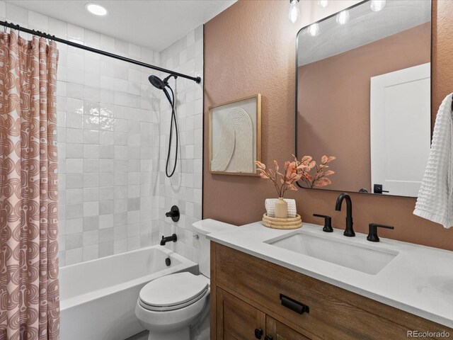 3560 S Glencoe St, Denver, CO 80237 - full bath featuring shower / bath combo with shower curtain, toilet, and vanity