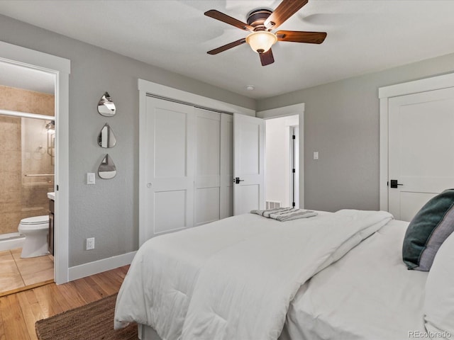 3560 S Glencoe St, Denver, CO 80237 - bedroom with baseboards, a closet, light wood finished floors, connected bathroom, and a ceiling fan