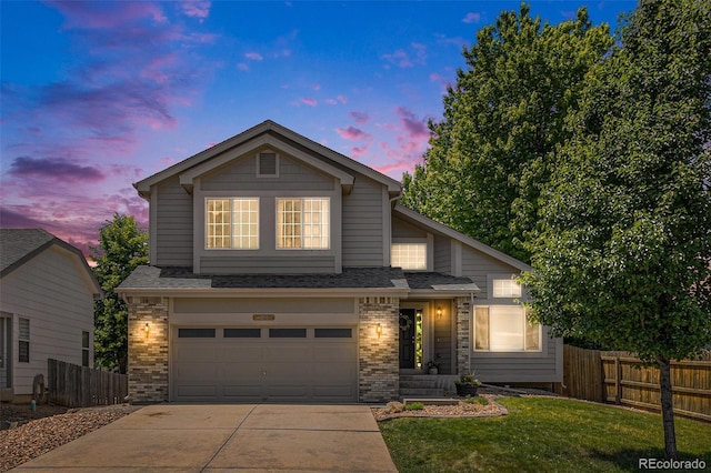 6230 Snowberry Ave, Firestone, CO 80504 - view of front facade featuring brick siding, concrete driveway, a garage, and roof with shingles
