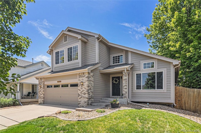 6230 Snowberry Ave, Firestone, CO 80504 - traditional-style house with an attached garage, driveway, and brick siding