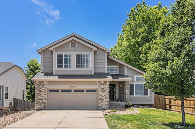 6230 Snowberry Ave, Firestone, CO 80504 - view of front facade with brick siding, concrete driveway, an attached garage, and roof with shingles