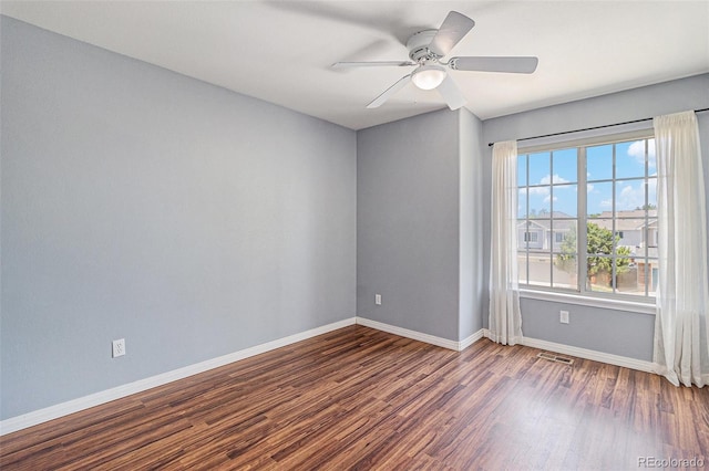 6230 Snowberry Ave, Firestone, CO 80504 - spare room featuring wood finished floors and ceiling fan